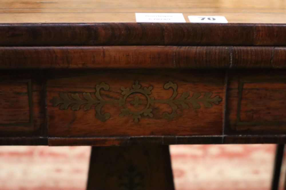 A Regency brass inlaid rosewood tea table, width 92cm, depth 46cm, height 75cm